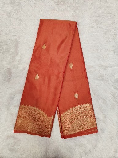 Orange Semi Kaanchi Saree with Copper Zari & Small Butta Design