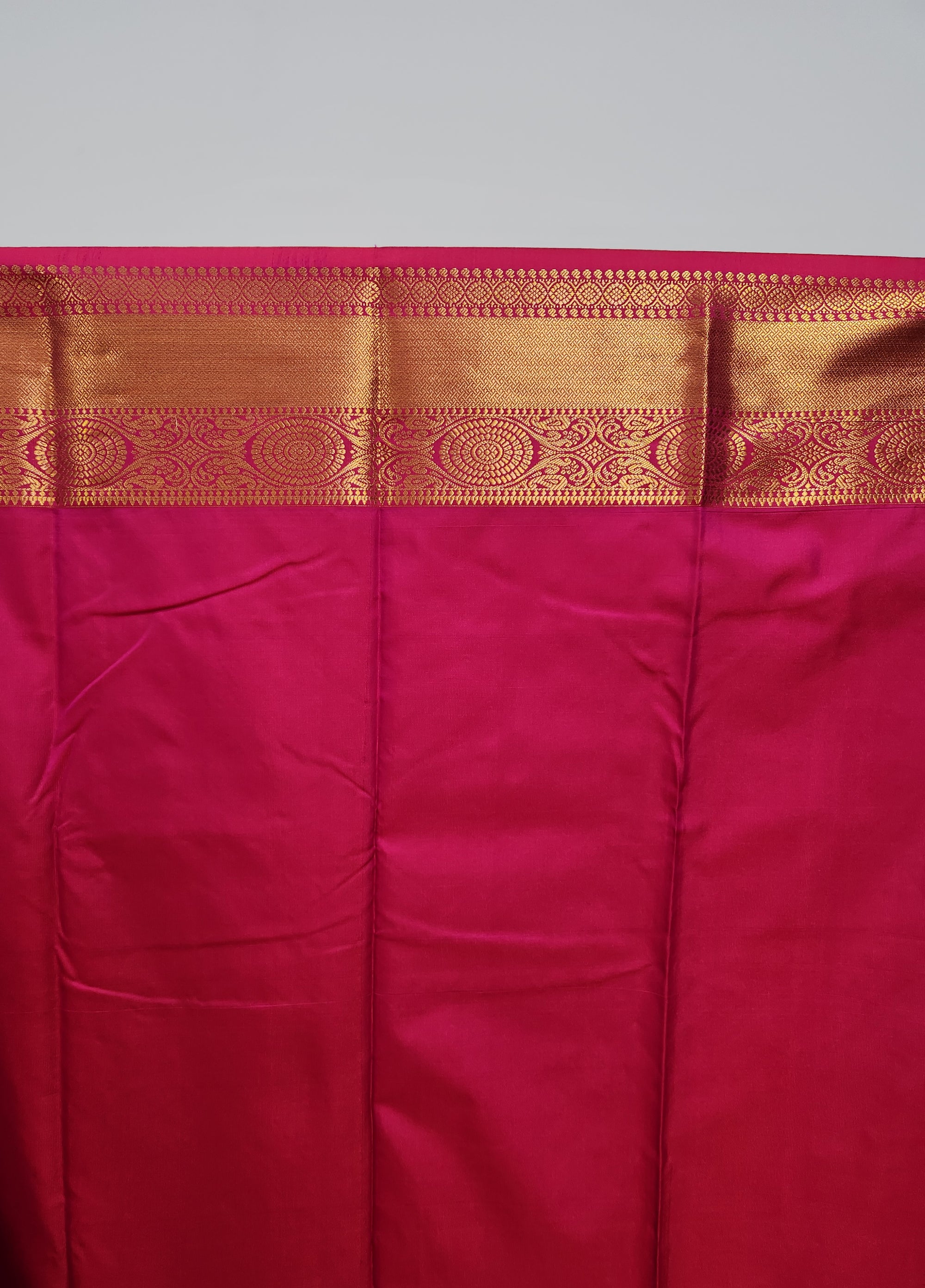 Pink Semi Kanchi Saree with Copper Zari & Small Butta Design
