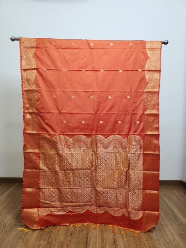 Orange Semi Kaanchi Saree with Copper Zari & Small Butta Design