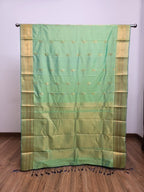 Emerald Green Semi Kaanchi Saree with Copper Zari & Small Butta Design