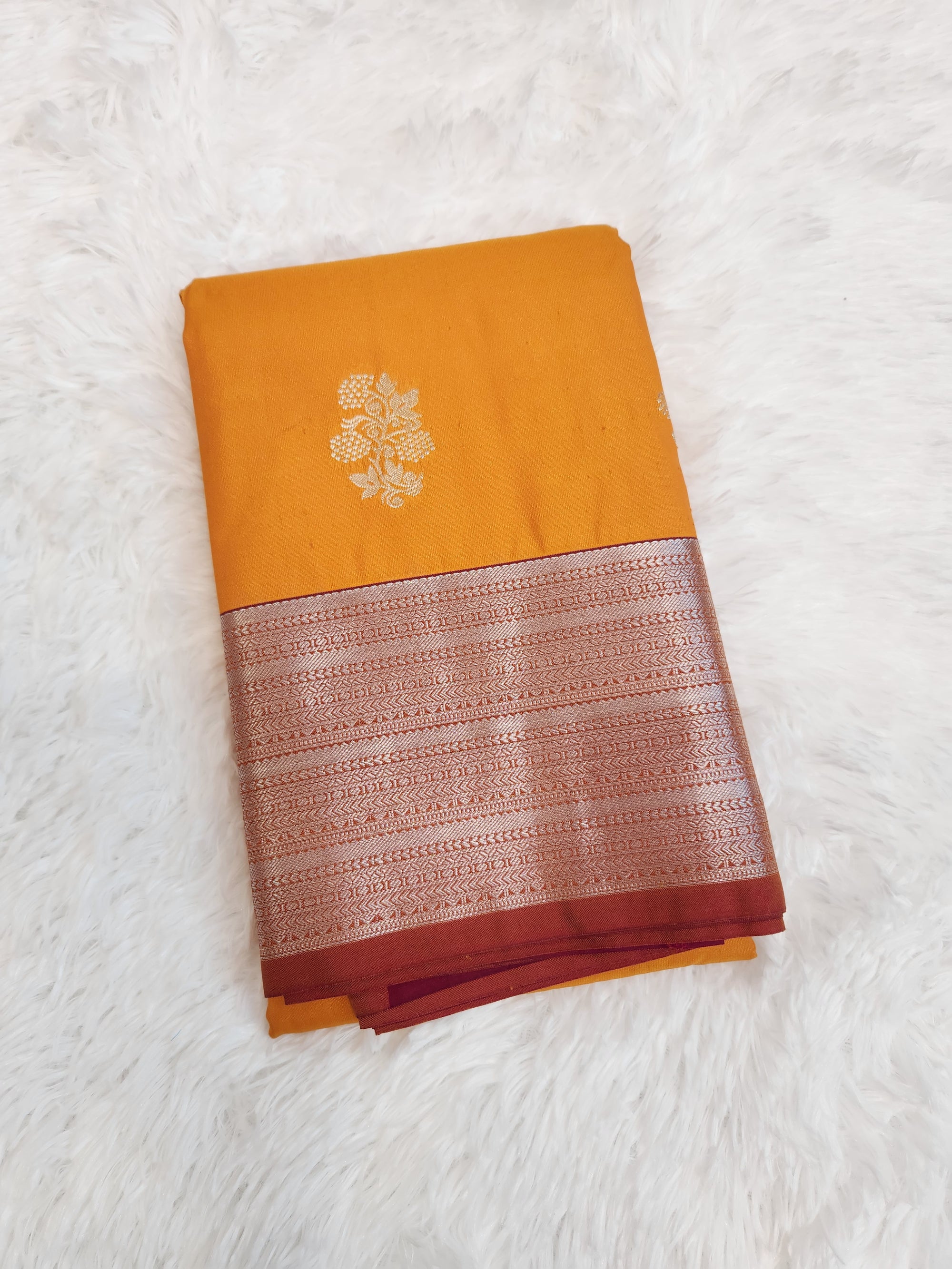 Marigold Yellow Semi Kanchi Saree with Silver Zari & Flower Butta Design