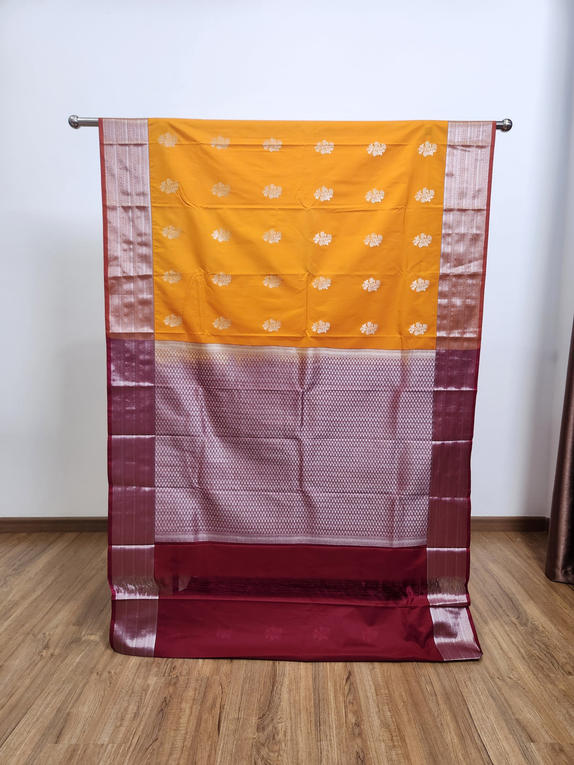 Marigold Yellow Semi Kanchi Saree with Silver Zari & Flower Butta Design