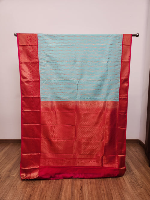 Baby Blue Semi Kanchi Saree with Copper Zari & Dark Pink Pallu