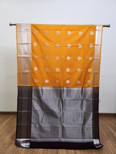 Sandal Yellow Semi Kaanchi Saree with Sliver Zari & Small Butta Design