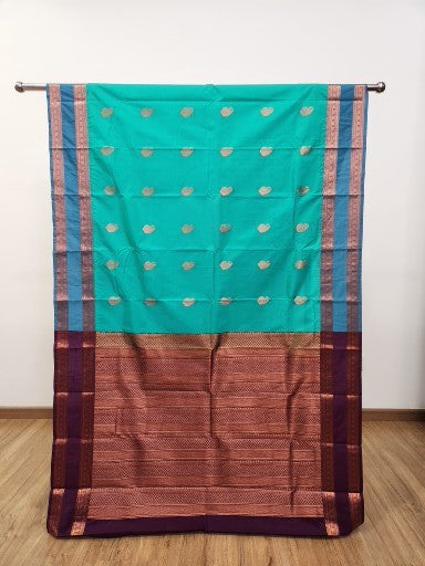 Green Semi Kaanchi Saree with Copper Zari & Small Butta Design
