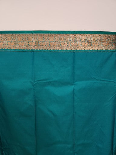 Salmon Semi Kanchi Saree with Copper Zari & Horizontal Line Design