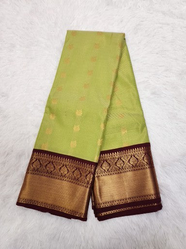 Pistachio Green Semi Kaanchi Saree with Gold Zari & Small Butta Design