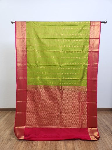Parrot Green Semi Kaanchi Saree with Gold Zari & Small Butta Design