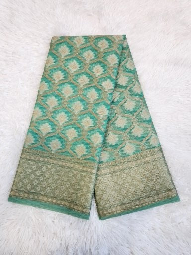 Emerald Green Tissue Saree with Copper Zari & Full Kodi Flower Butta Design