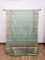 Emerald Green Tissue Saree with Copper Zari & Full Kodi Flower Butta Design