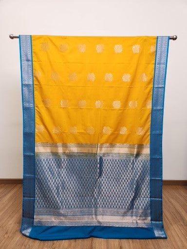 Light Brown Semi Kaanchi Saree with Silver Zari & Small Butta Design
