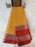 Mango Yellow Fancy Saree With Silver Zari & Red Striped Pallu Design