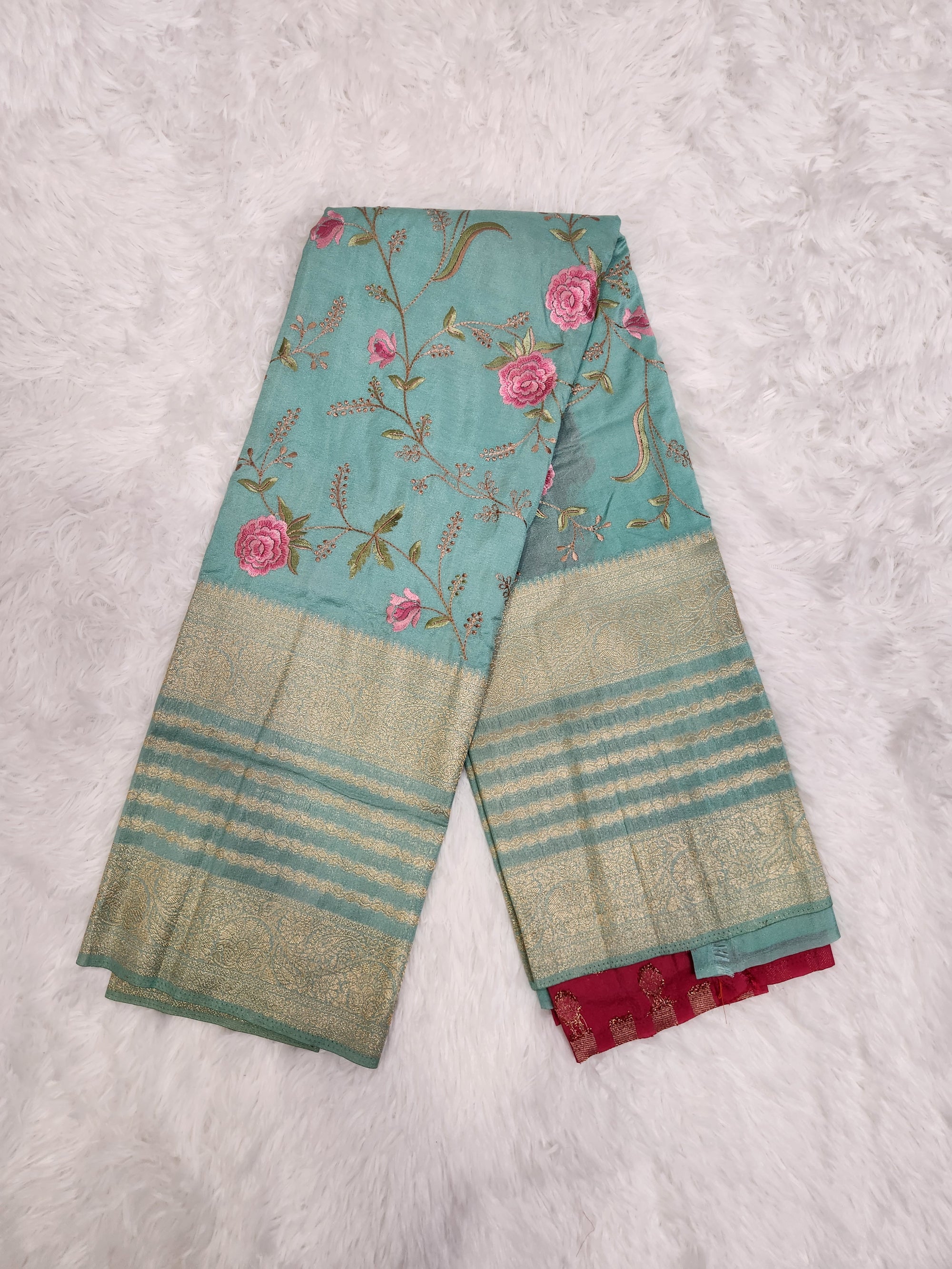 Emerald Green Soft Silk Saree with Copper Zari & Pink Blouse Embroidery Design