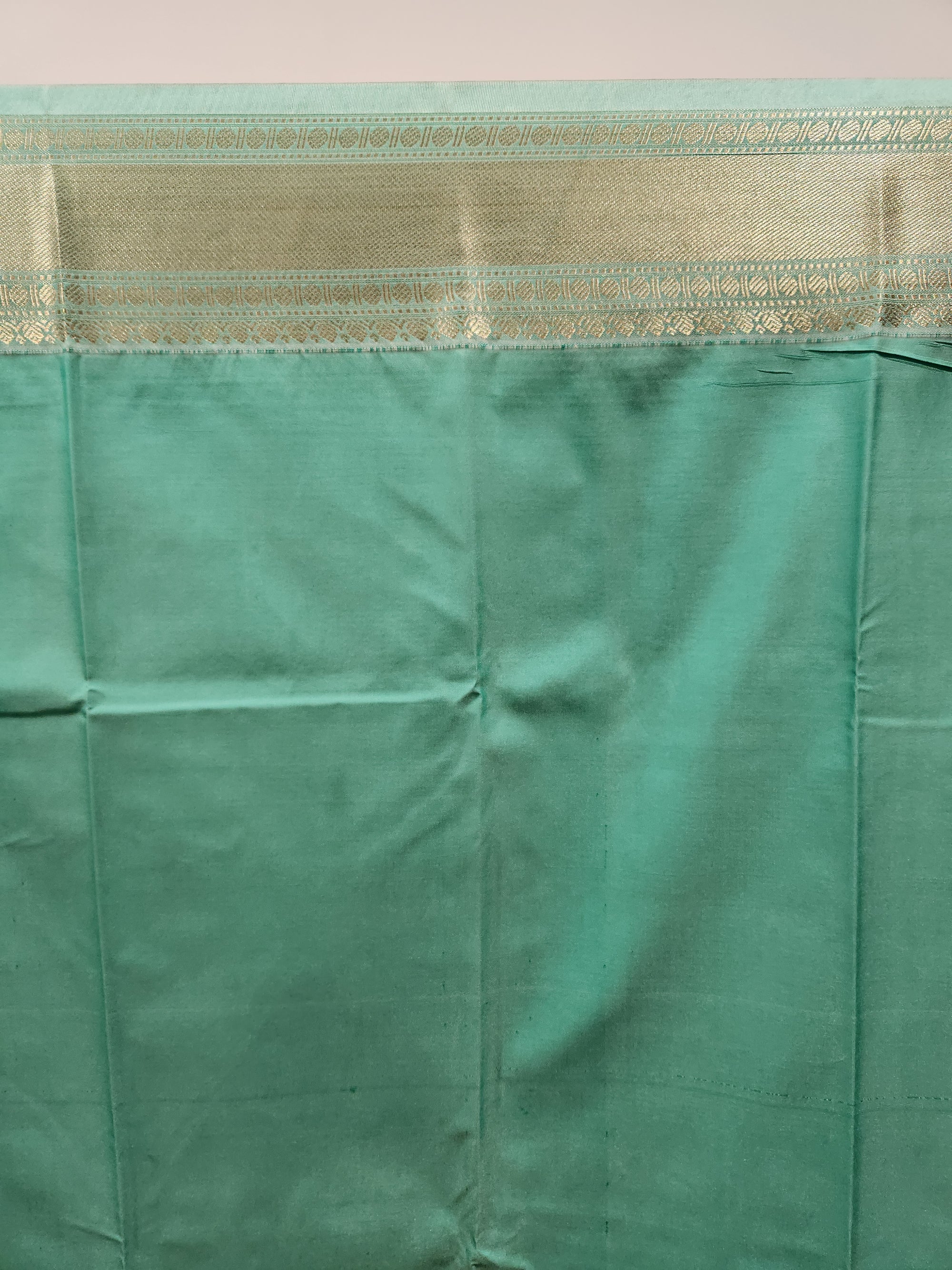 Dark Brown Semi Kanchi Saree with Copper Zari & Pistachio Green Pallu Design