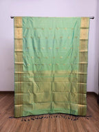 Emerald Green Semi Kaanchi Saree with Copper Zari & Small Butta Design - Urban Weave Sarees