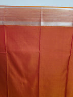Rust Orange Semi Kanchi Saree with Silver Zari & Flower Butta Design - Urban Weave Sarees